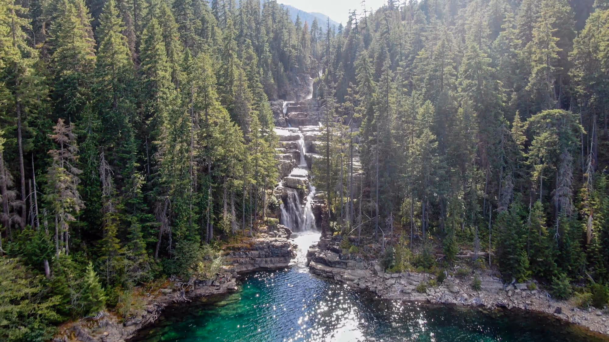bird's eye view of lower myra falls and where it meets buttle lake