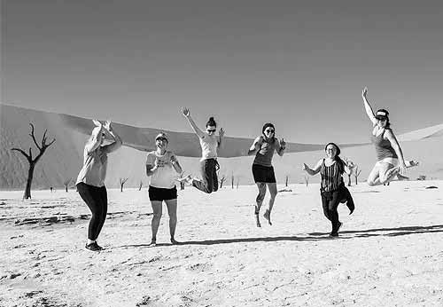Our happy team visiting Sossusvlei