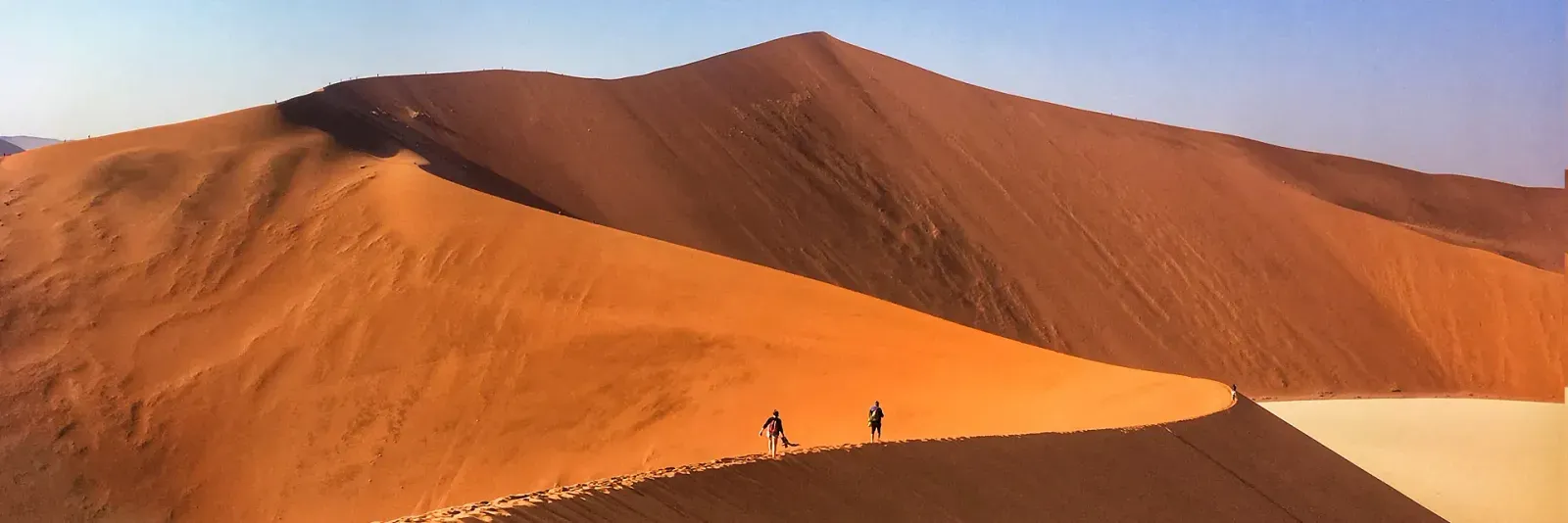 Guests climbing Big Daddy dune in Sossusvlei