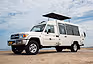 Safari vehicle with pop-up roof