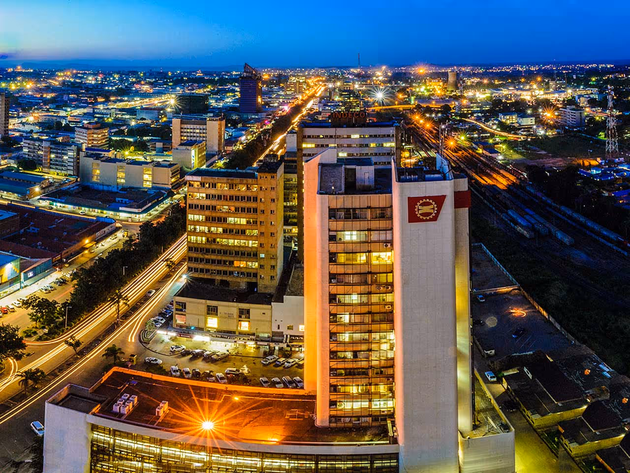 A view over the buildings of Lusaka at night. 