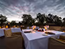 An outdoor dining setting at Hwange Bush Camp.