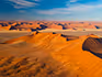 The endless landscape of sand dunes in the Namib Desert at Sossusvlei. 