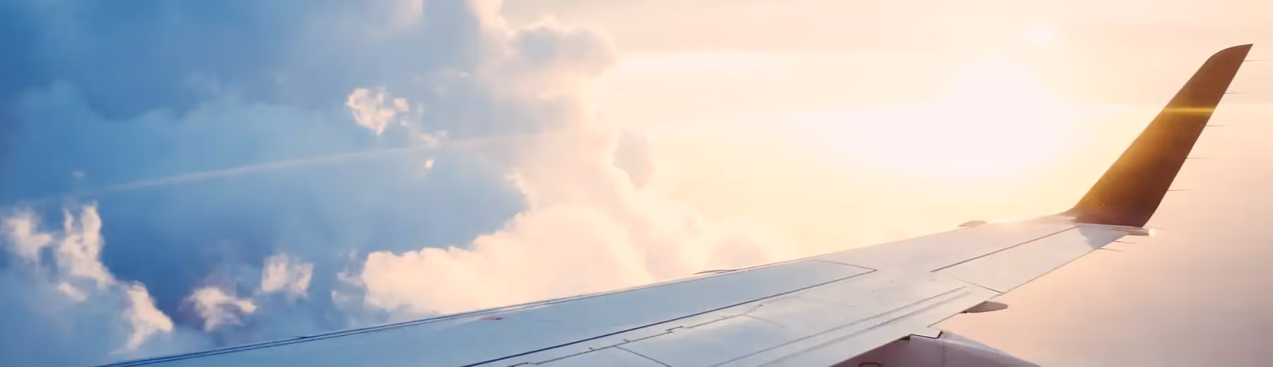 Above the clouds: Capturing the stunning aerial view from an airplane.