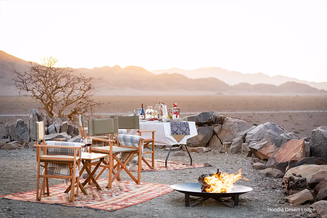 Back at the lodge, toast the day’s adventures while admiring the horizon’s amber hues.
