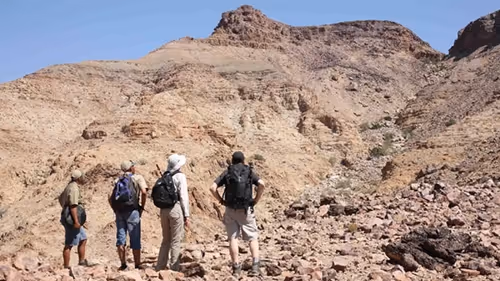 Hikers contemplate the next uphill challenge along the Fish River hike.