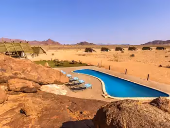 The refreshing pool at Desert Quiver Camp