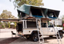Explore Namibia in a rugged 4x4 Land Cruiser camping vehicle with two rooftop tents – perfect for family self-drive safaris.