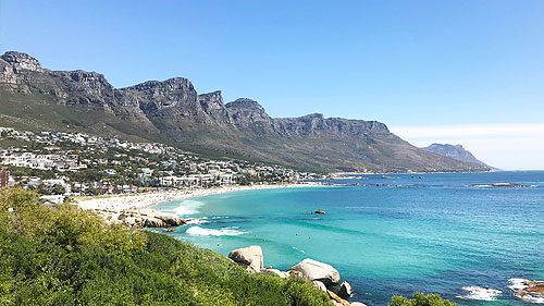 A breathtaking vista of Cape Town's stunning beaches and majestic mountains.