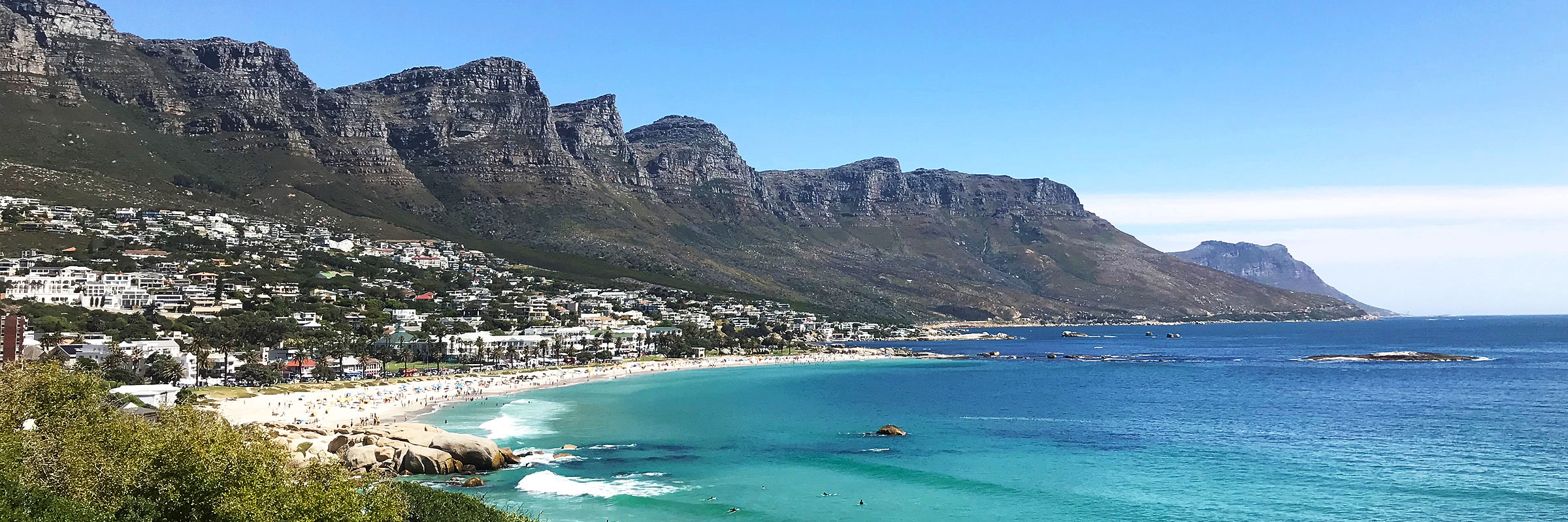 A breathtaking vista of Cape Town's stunning beaches and majestic mountains.