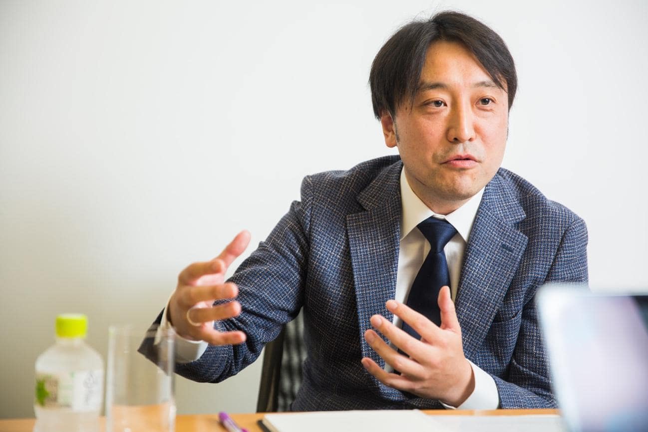 そのボトルネックのひとつに、コミュニケーションコストの増加があるという。