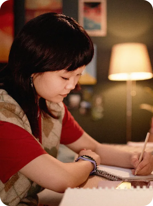Set Focus Time image showing young girl doing homework.