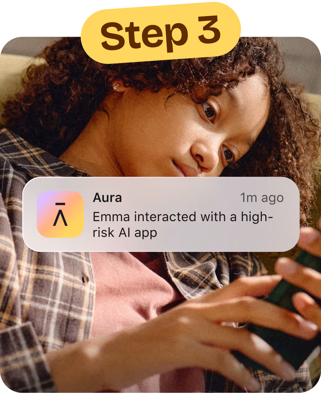 Young girl looking at her mobile device in the background with an Aura Alert on top mentioning a high-risk app was interacted with