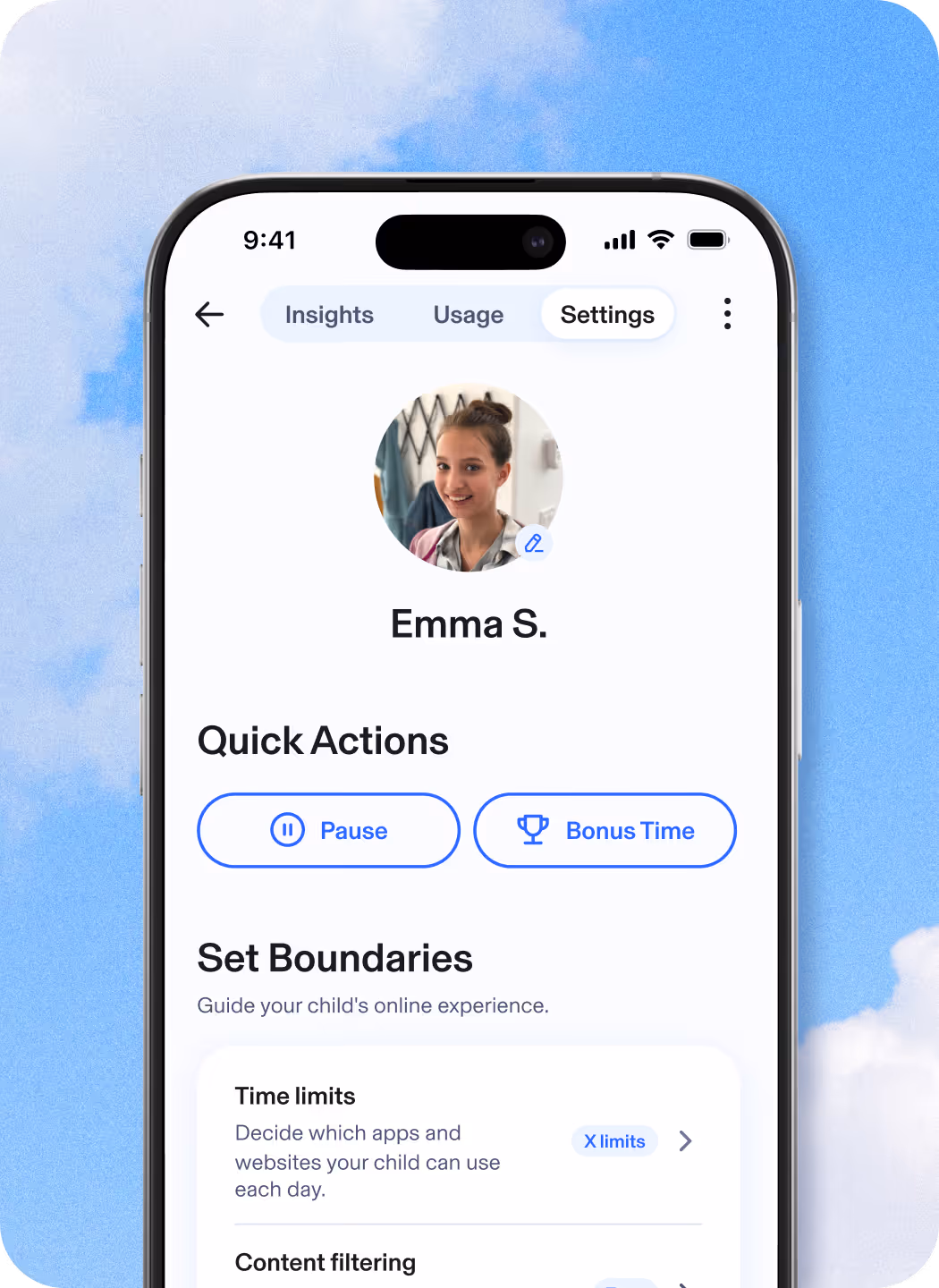 Smiling boy using headphones.