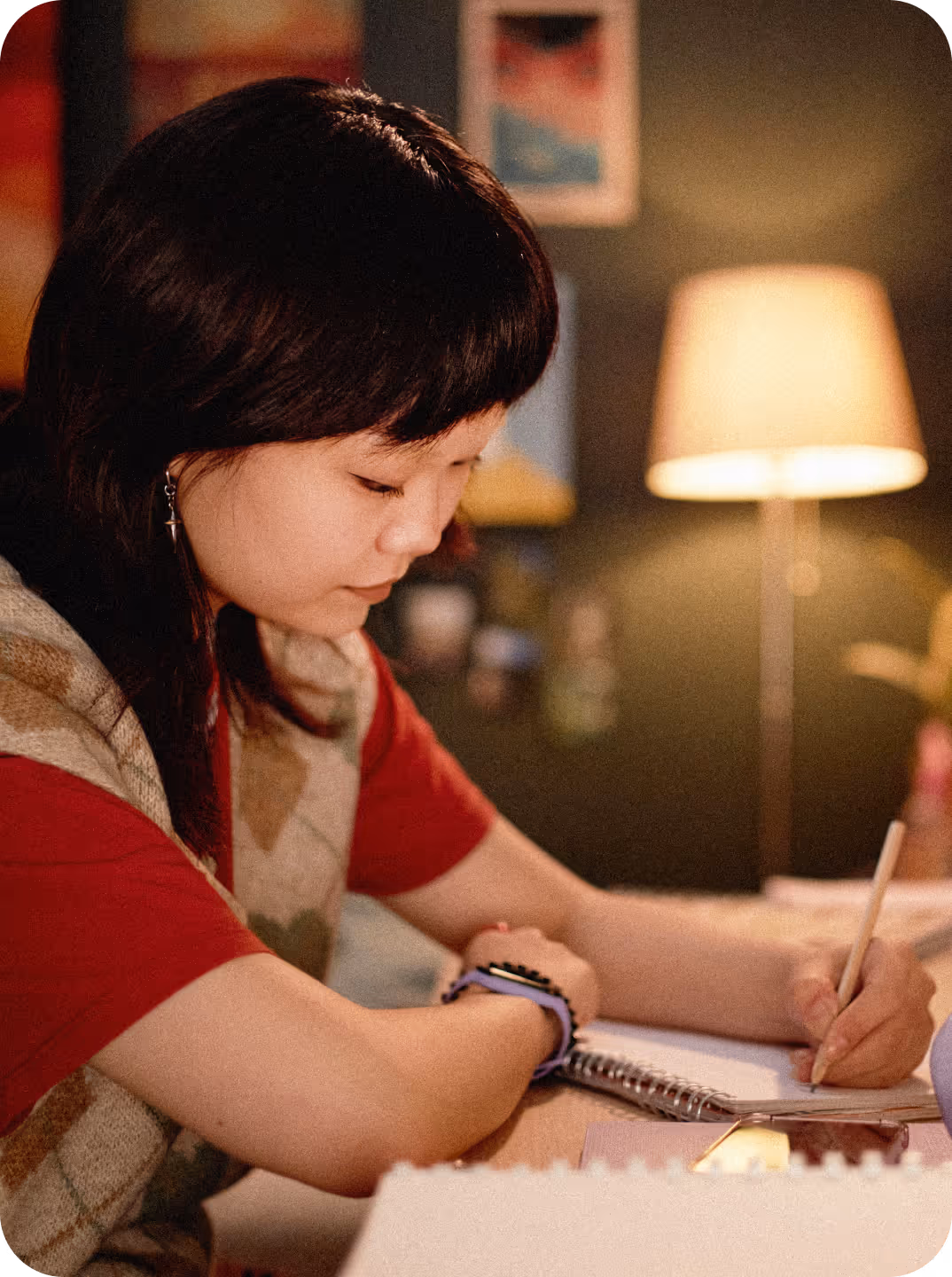Child laughing with their parent.