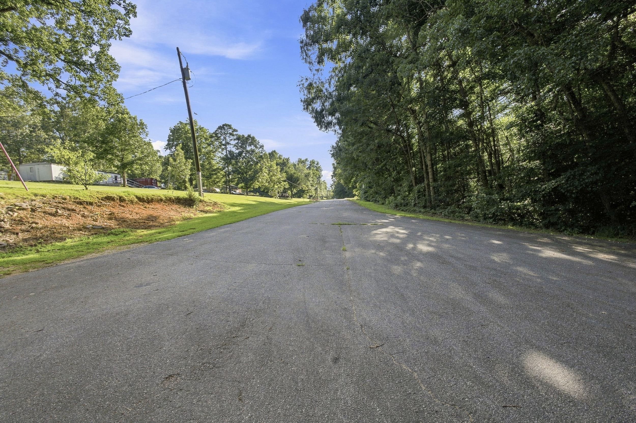Street view away from the lot on Woodlawn Hills Drive