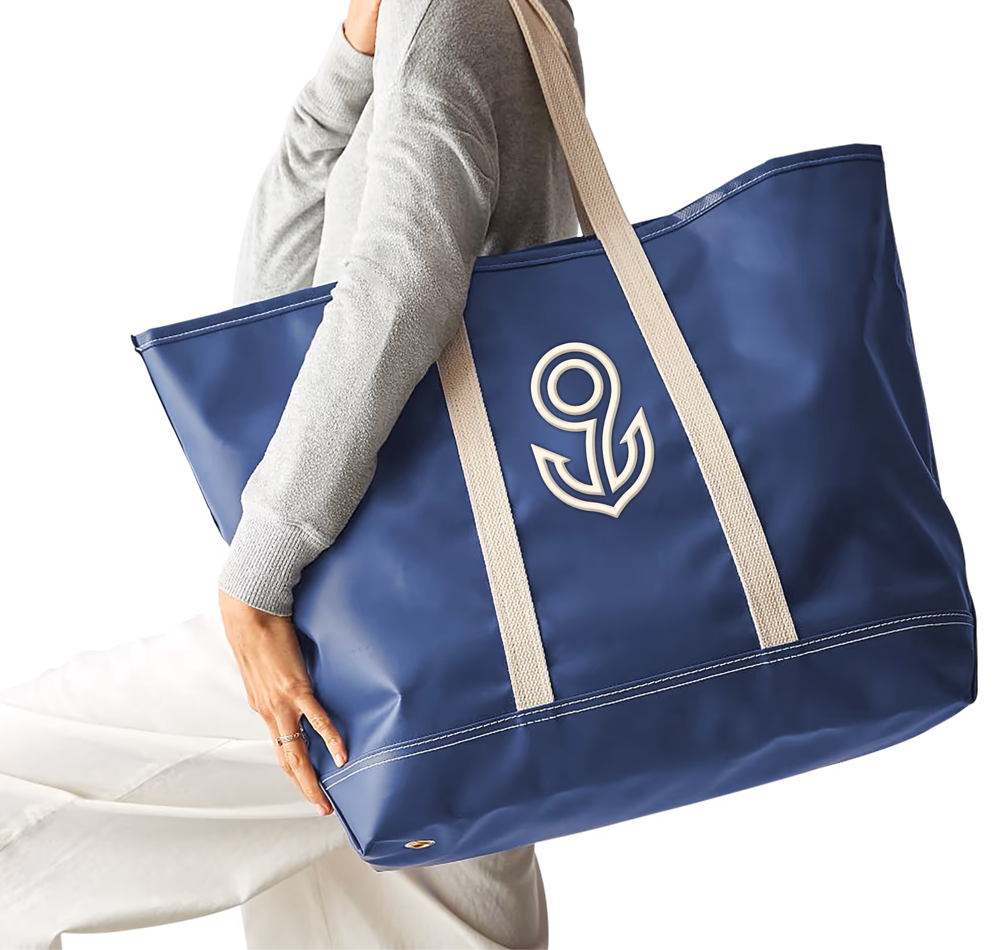 A tote bag with the Nine Marina brand mark.
