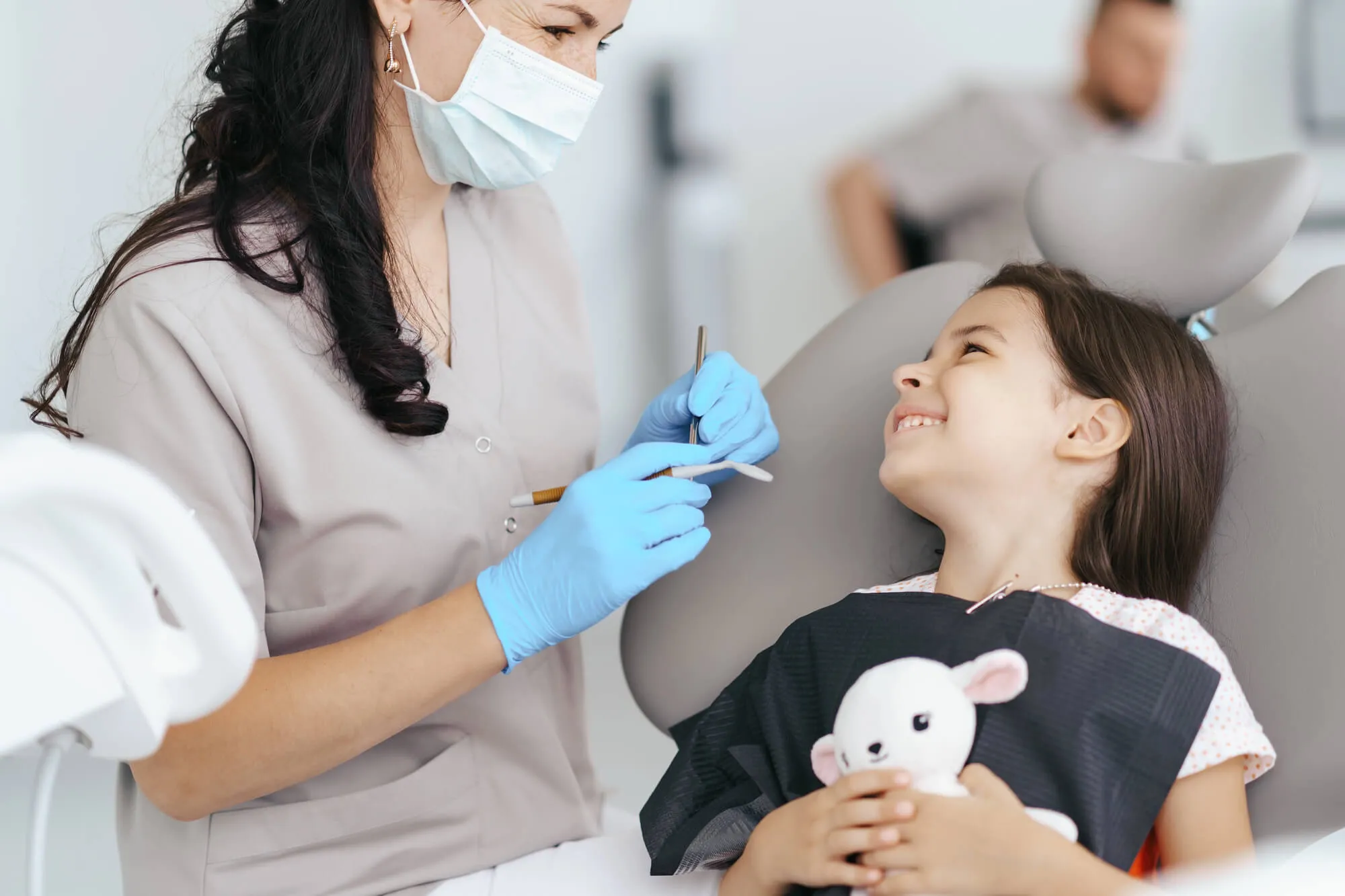 Family dentist Candler NC smiling at patient