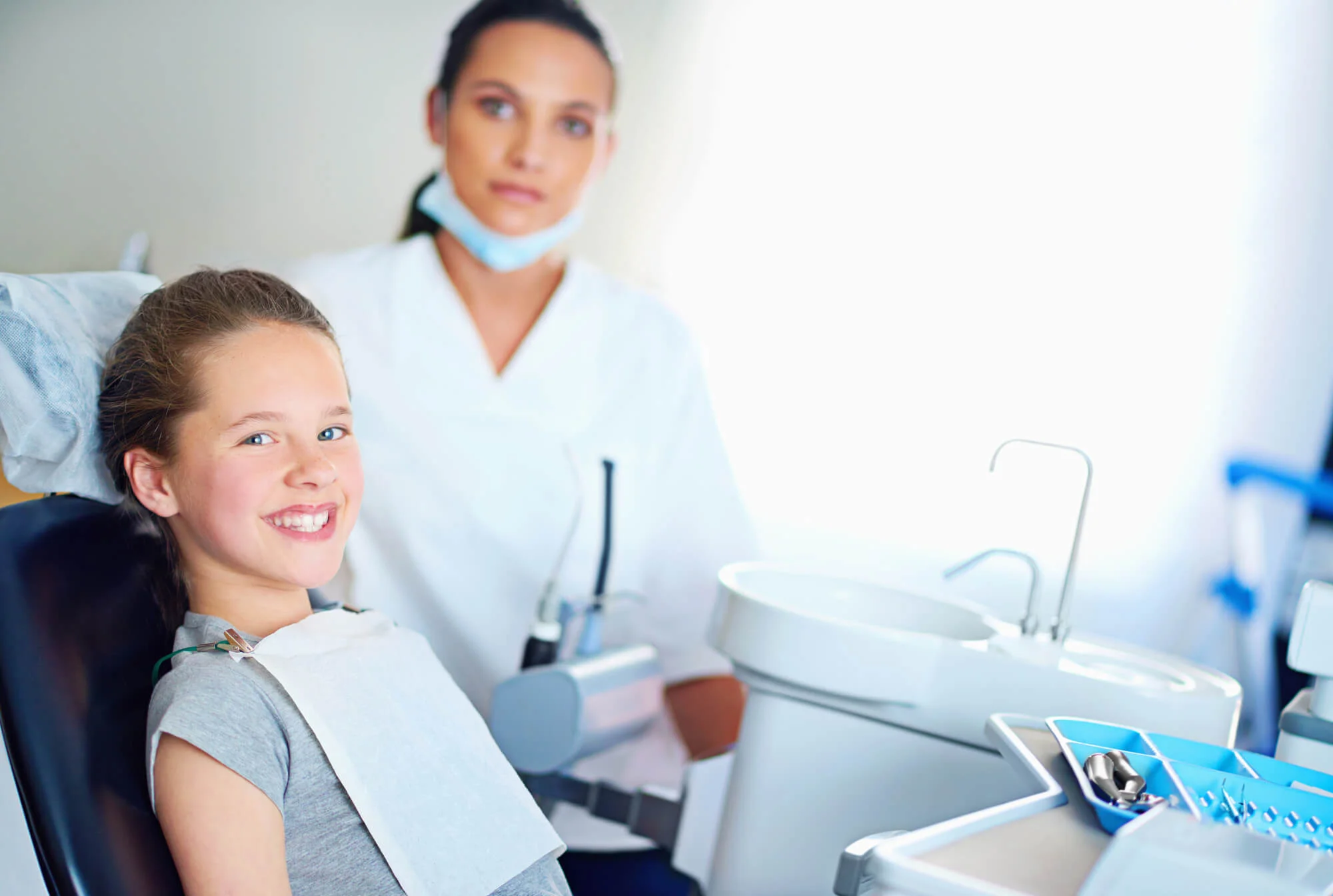 smiling girl family dentist in Candler, NC