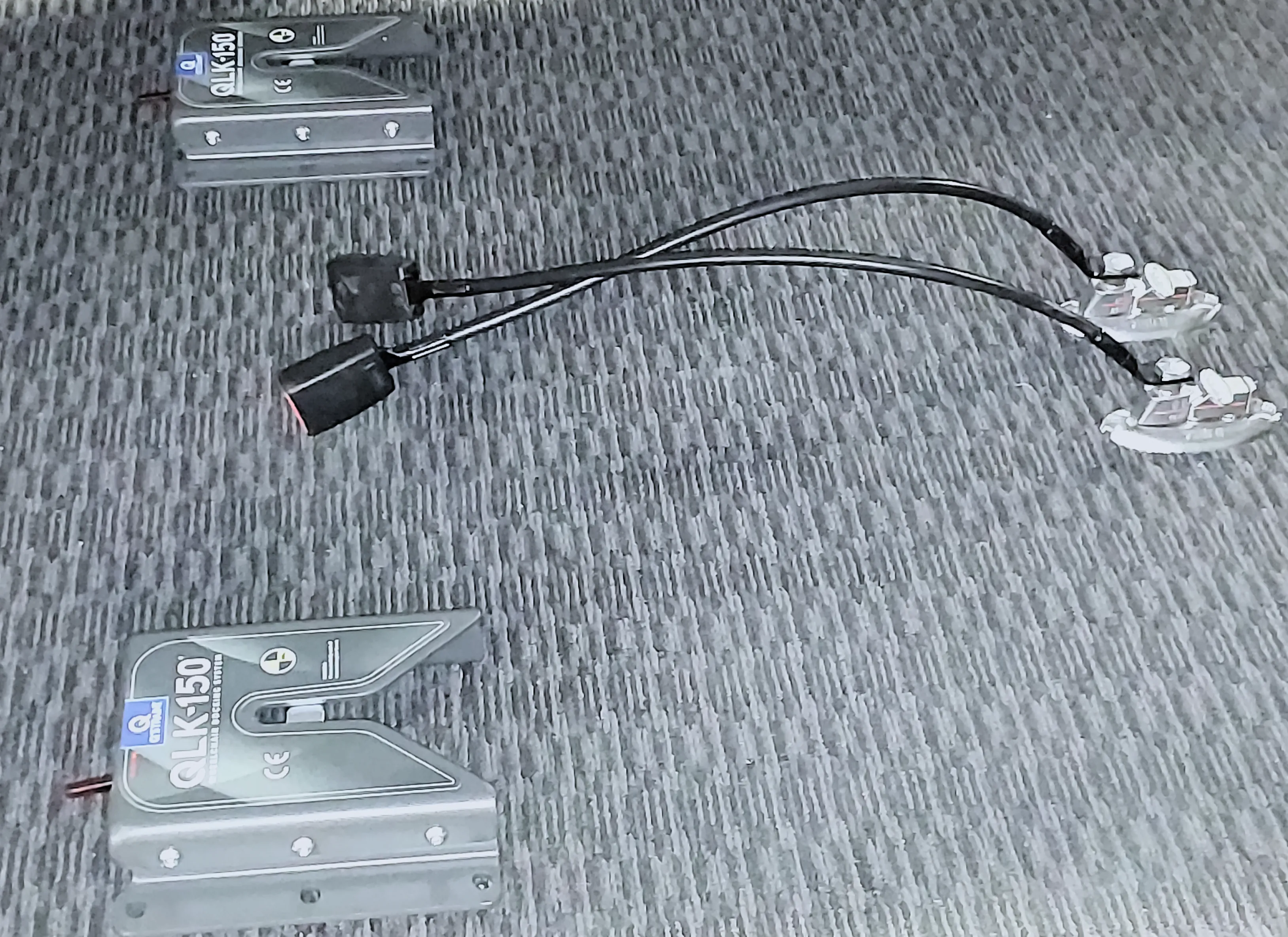 A wheelchair locking mechanism installed on to the floor of a vehicle.