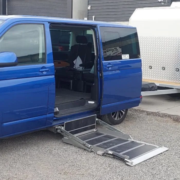 A side entrance hydraulic vehicle entry hoist.