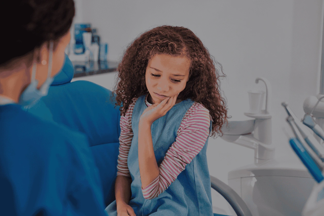 Tooth with sensitivity highlighted, showing pain from hot or cold foods