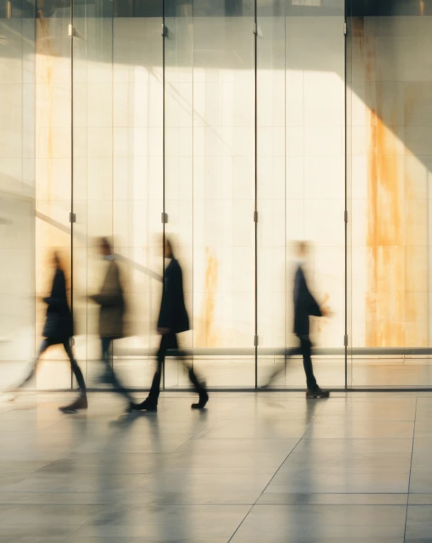 A grahics of people walking in the office.