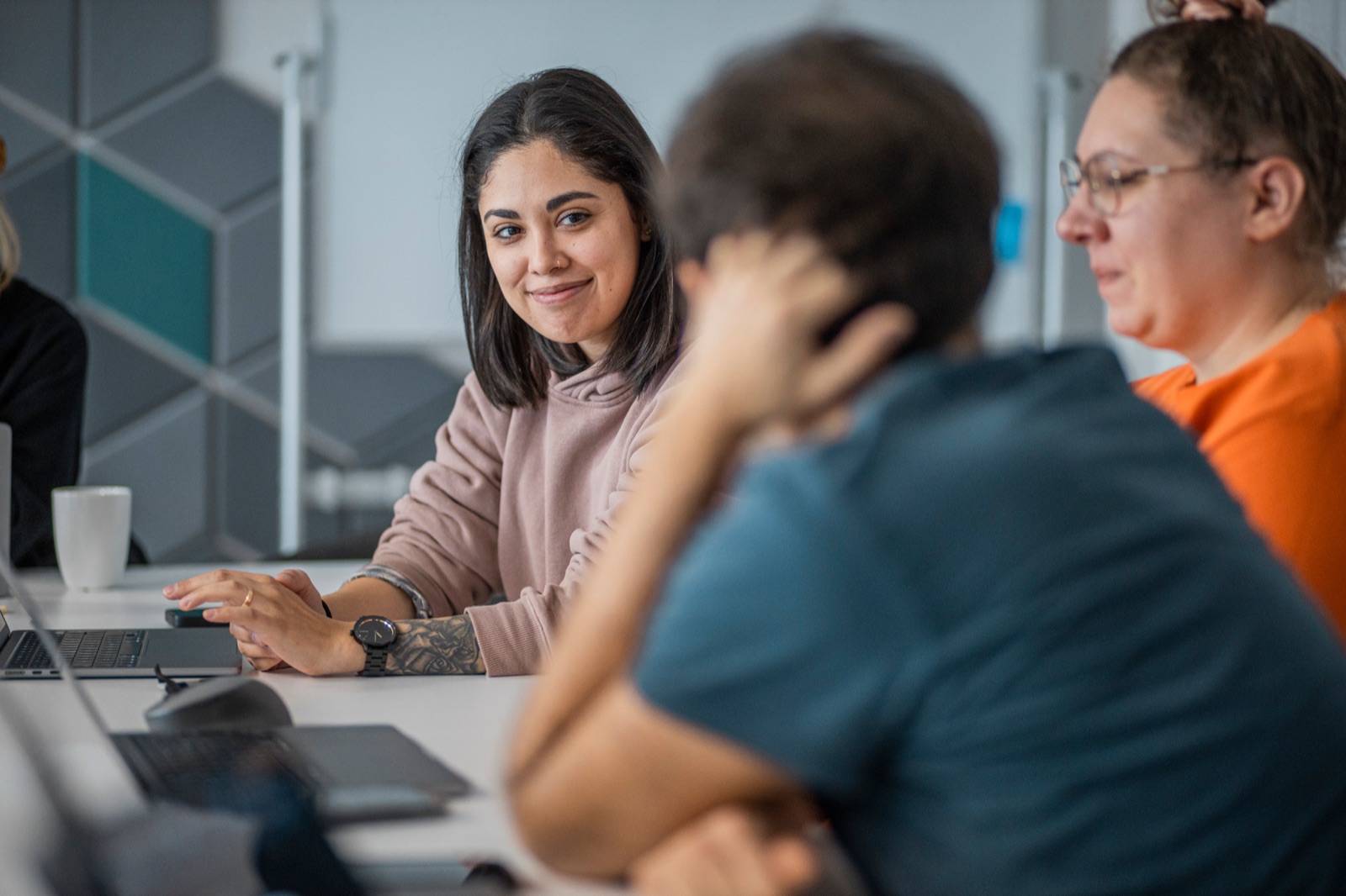 STX Next engineers collaborating at a desk