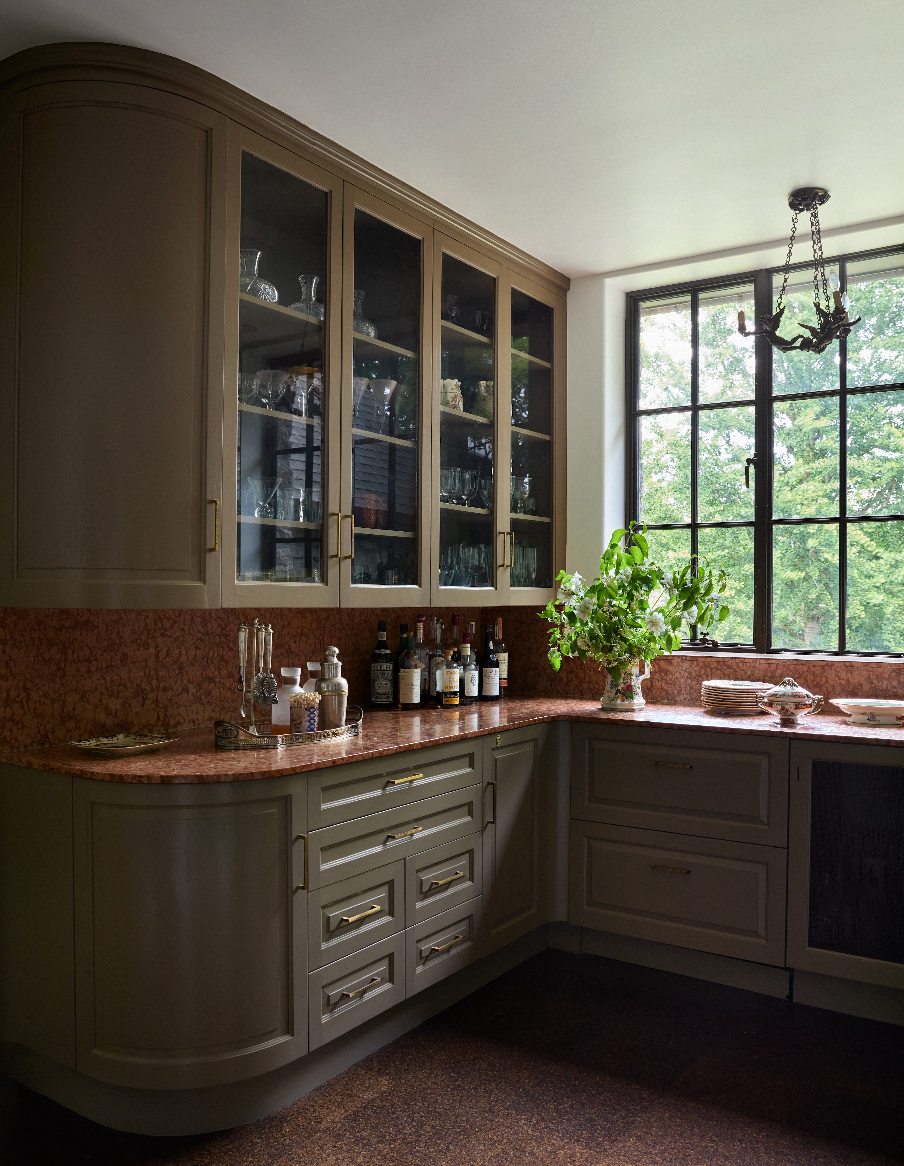 Upstate New York kitchen corner with glass-front cabinets