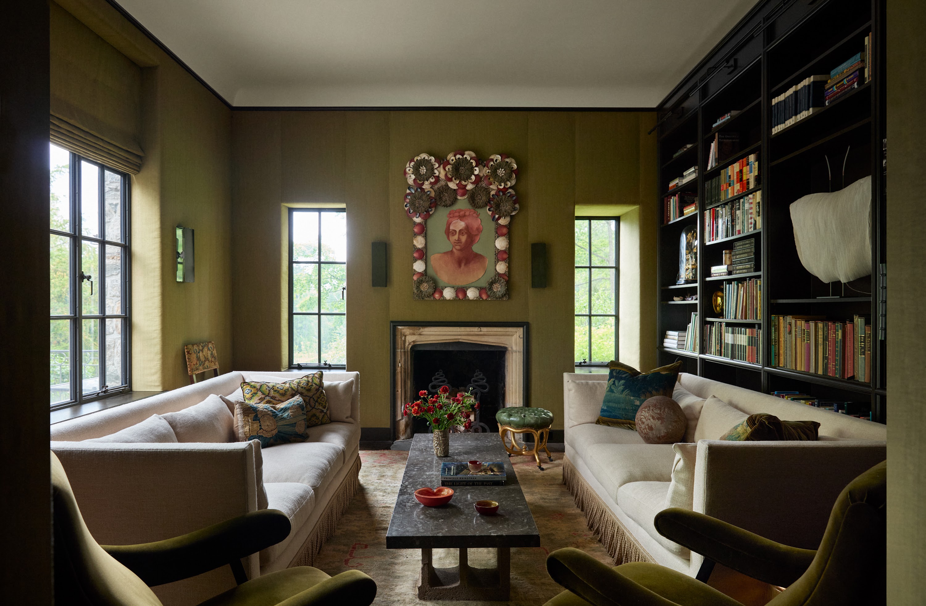 Upstate New York library with bookshelves and sofas