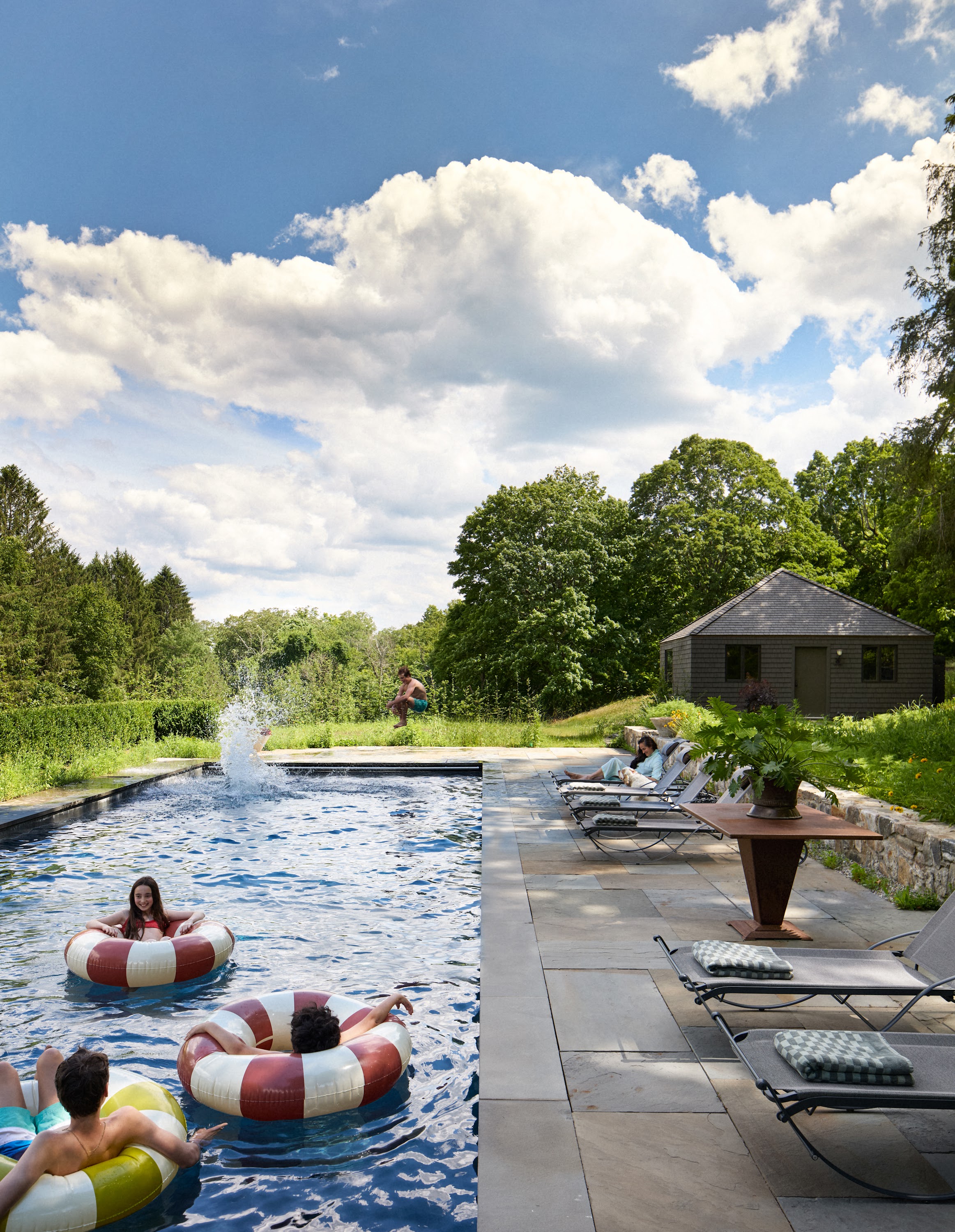 Swimming pool and pool house at the Upstate New York home