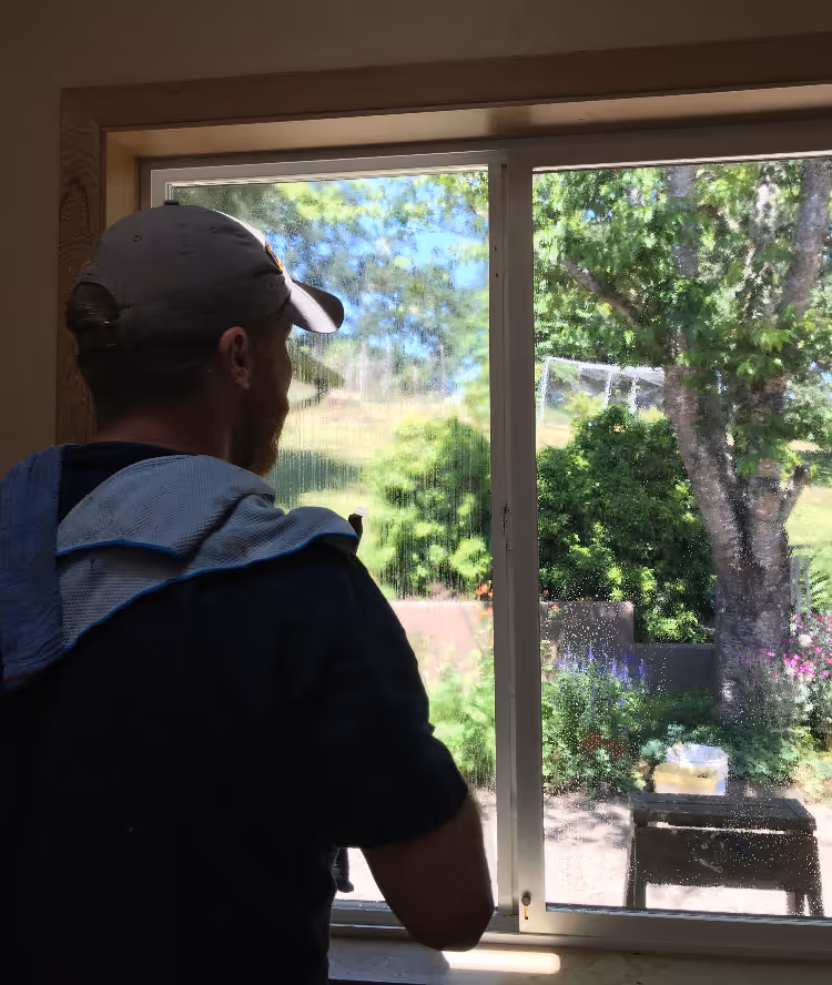 Interior window cleaning in progress in Portland, OR.