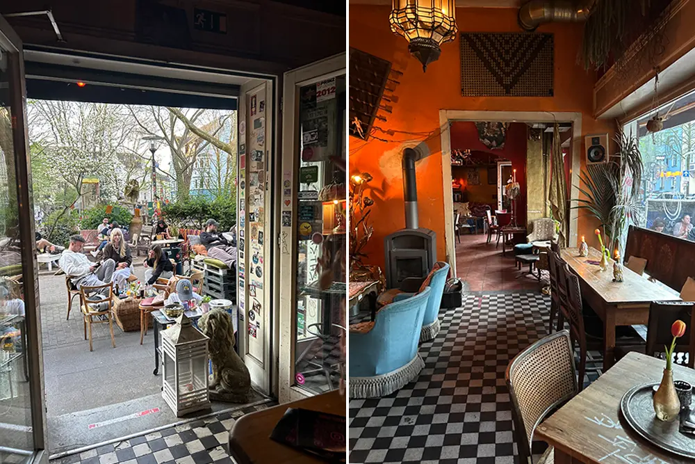 Außenterrasse mit Leuten, die chillen und Blick ins Café Goldbar mit Jugendstil-Interieur, gemixten Stühlen wunderschönen Fliesenboden 