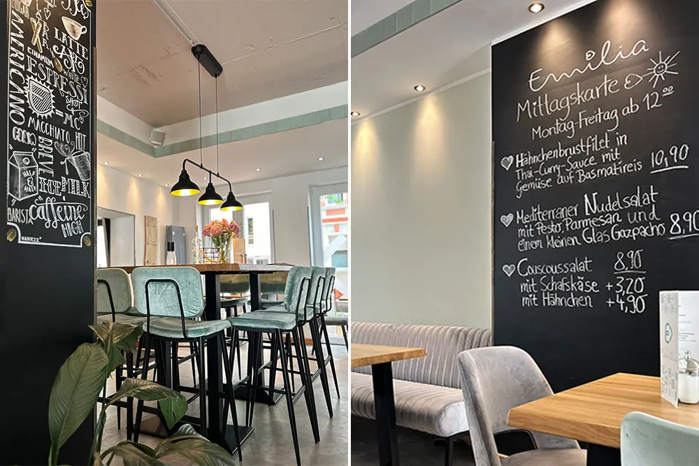 Blick in helle Räumlichkeiten mit Reihen von Stühlen und Tischen vor   Tafel an der Wand, Cafe Emilia Rue in Essen-Rüttenscheid