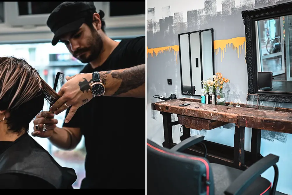 Blick in Friseursalon. Retro-Stücke mit stylischer Einrichtung im Wohlfühlatmosphäre. Junger Friseur mit Schere an der Hand bei seinem Handwerk. Saloon, Essen-Rüttenscheid