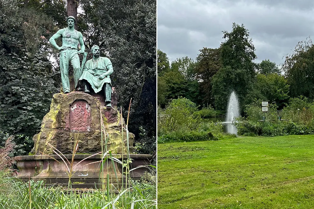 Das historische Denkmal mit Arbeitern sowie der Ententeich mit Wasserfontäne im Kaiser-Wilhelm-Park in Essen.