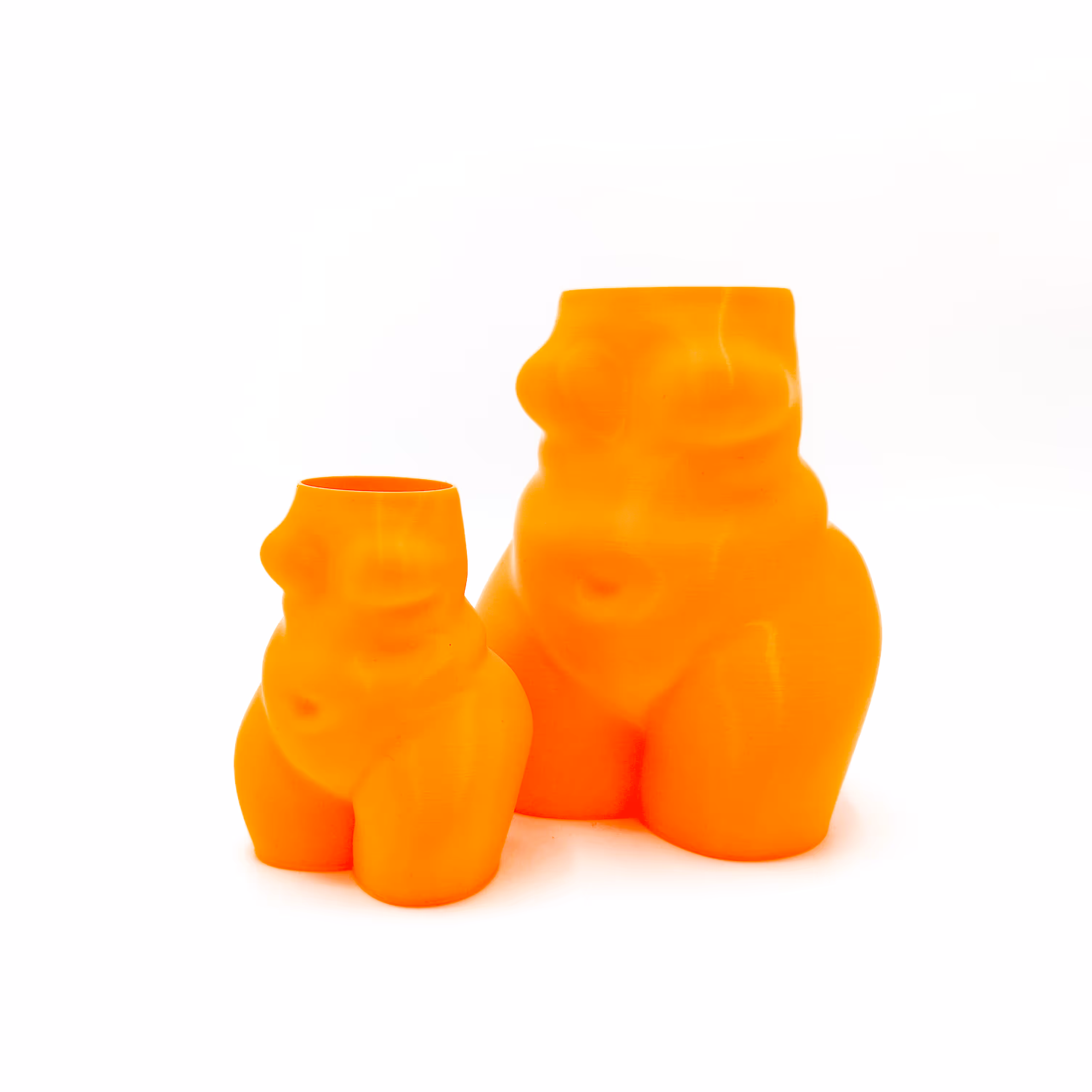 Penseelhouder in de vorm van een vrouw, 3D geprint in fluo oranje