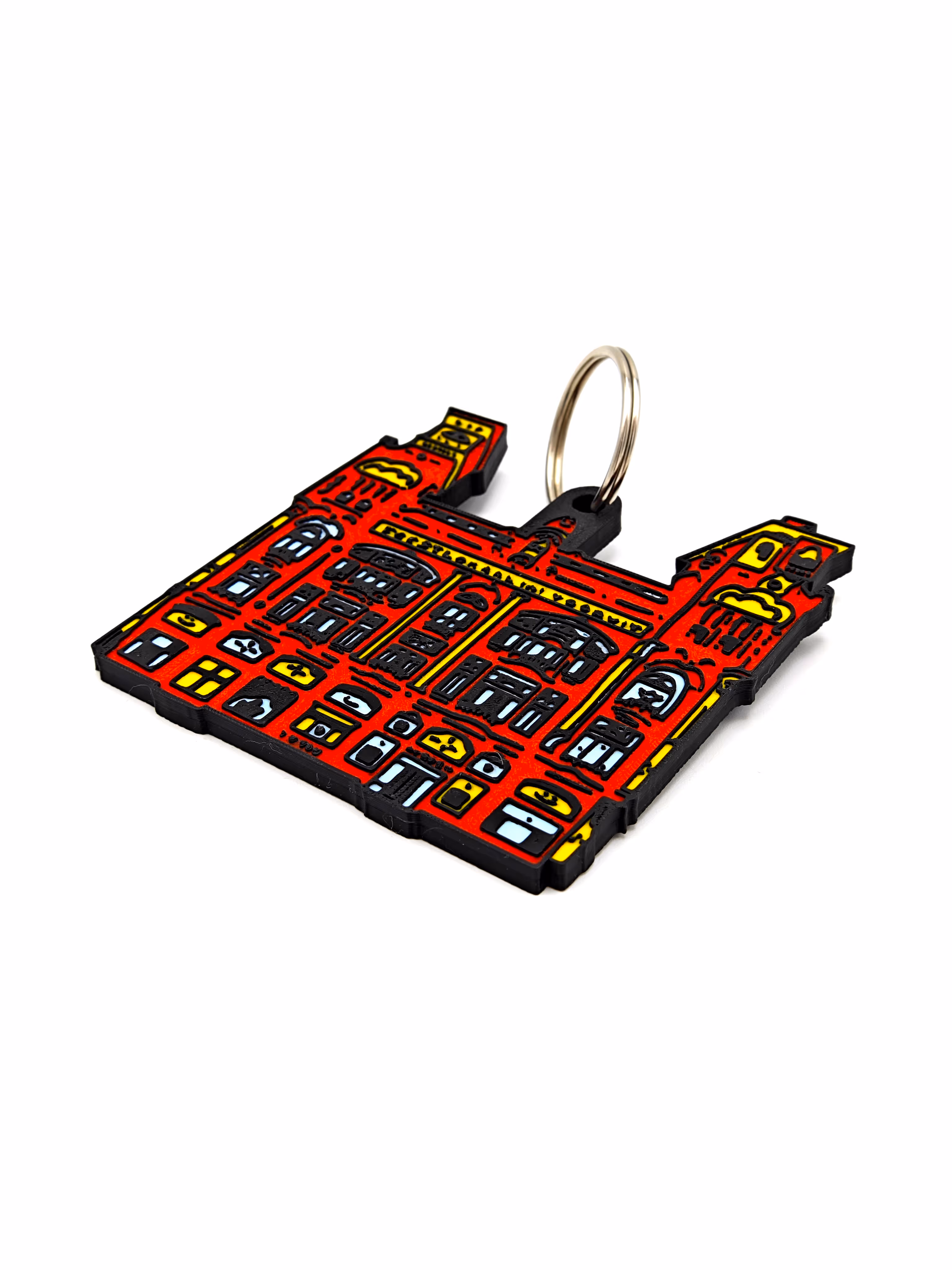 3d geprinte sleutelhanger in 4 kleuren in de vorm van de facade van de vooruit in Gent. Multicolor 3D print geproduceerd door antistatic bv