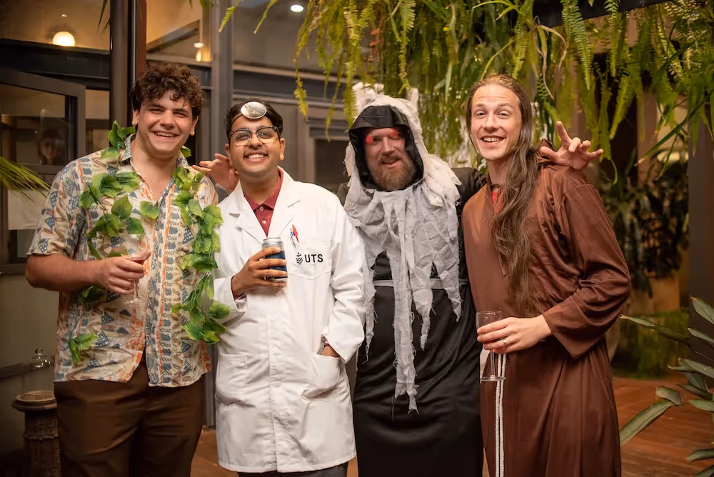 Meet our Software Engineer Intern Adi Pandey: four male professionals at a company costume party