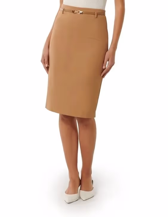 Business Casual Dress Code for Client-Side Project Managers: A photo of a woman wearing a midi skirt in a neutral color.