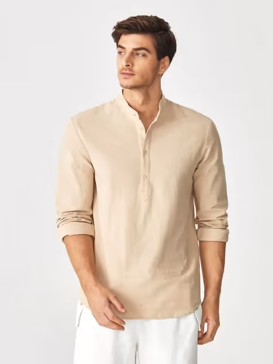 Business Casual Dress Code for Client-Side Project Managers: A photo of a man wearing a button down shirt. 