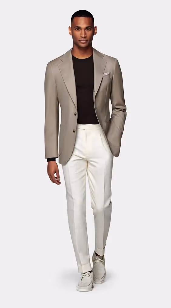 Business Casal Dress Code for Client-Side Project Managers: A photo of a man wearing a blazer in neutral color.