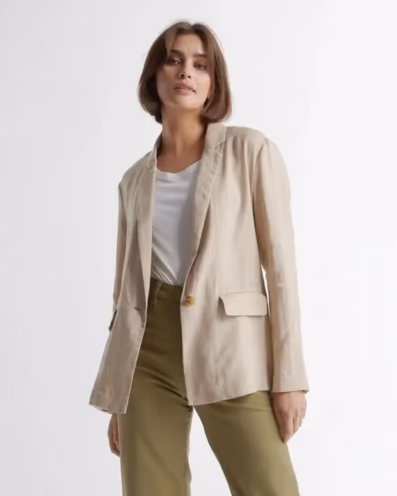 Bsiness Casual Dress Code for Client-Side Project Managers: A photo of a woman wearing a cardigan/blazer.