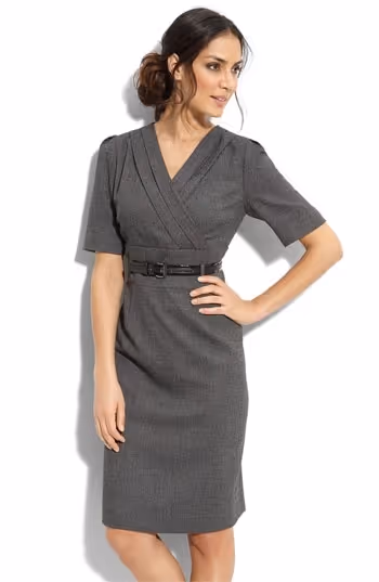 Busines Casual Dress Code for Client-Side Project Managers: An image of a woman wearing a casual dress.