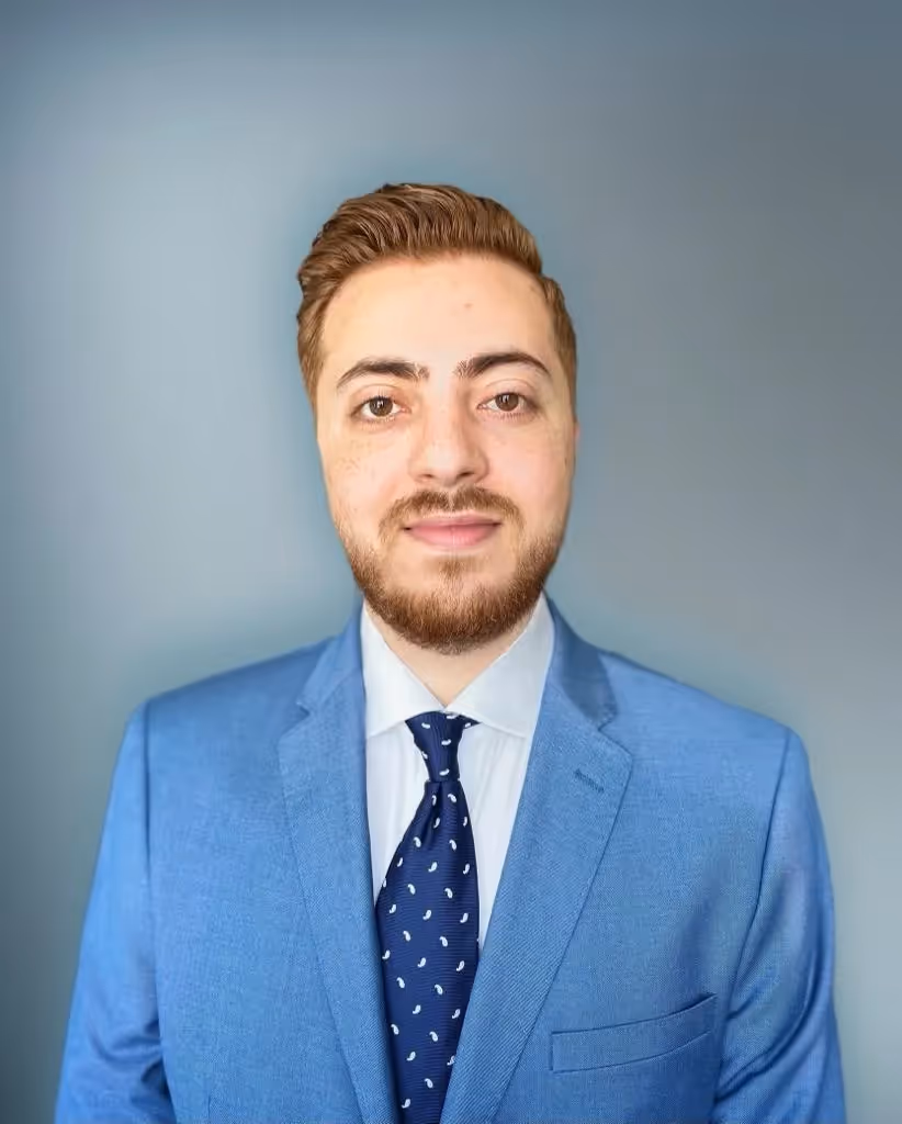 Meet Ezzeddin, Our Team Member in Dubai, UAE: A portrait photo of a corporate professional in formal attire