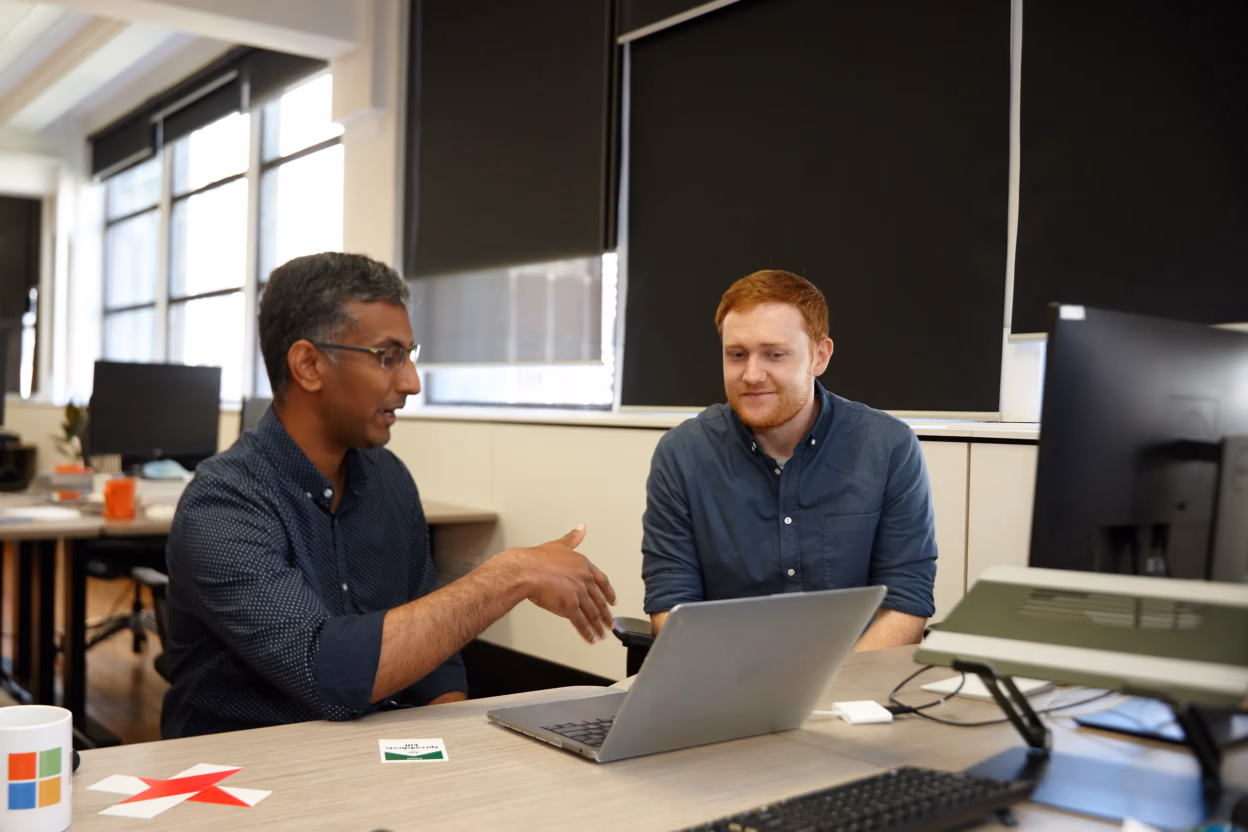 TMastt Named One of Australia's Best Places to Work in 2022: wo professionals discussing their works