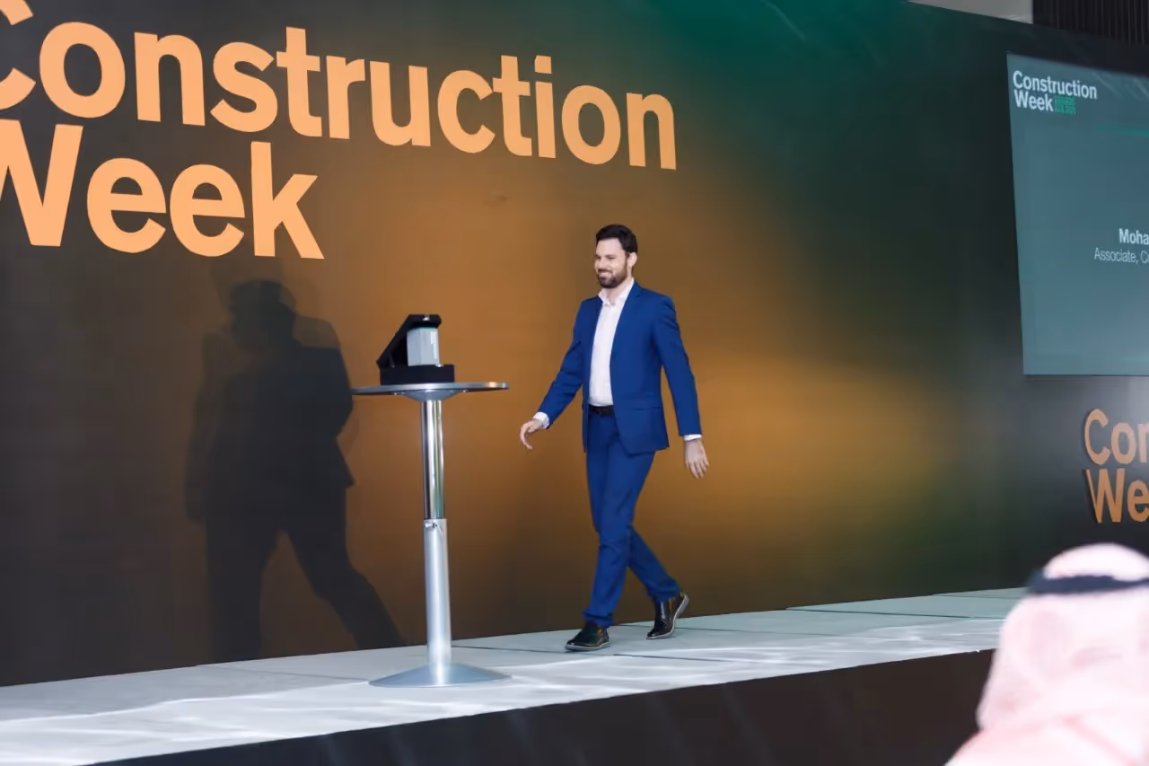 Meet the Project Manager: Mohammed Salameh from Compass: A male professional receiving an award about construction