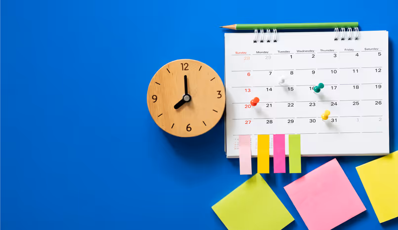 Calendar with pinned dates and a clock, symbolising Rostered Days Off (RDO) in Australia.