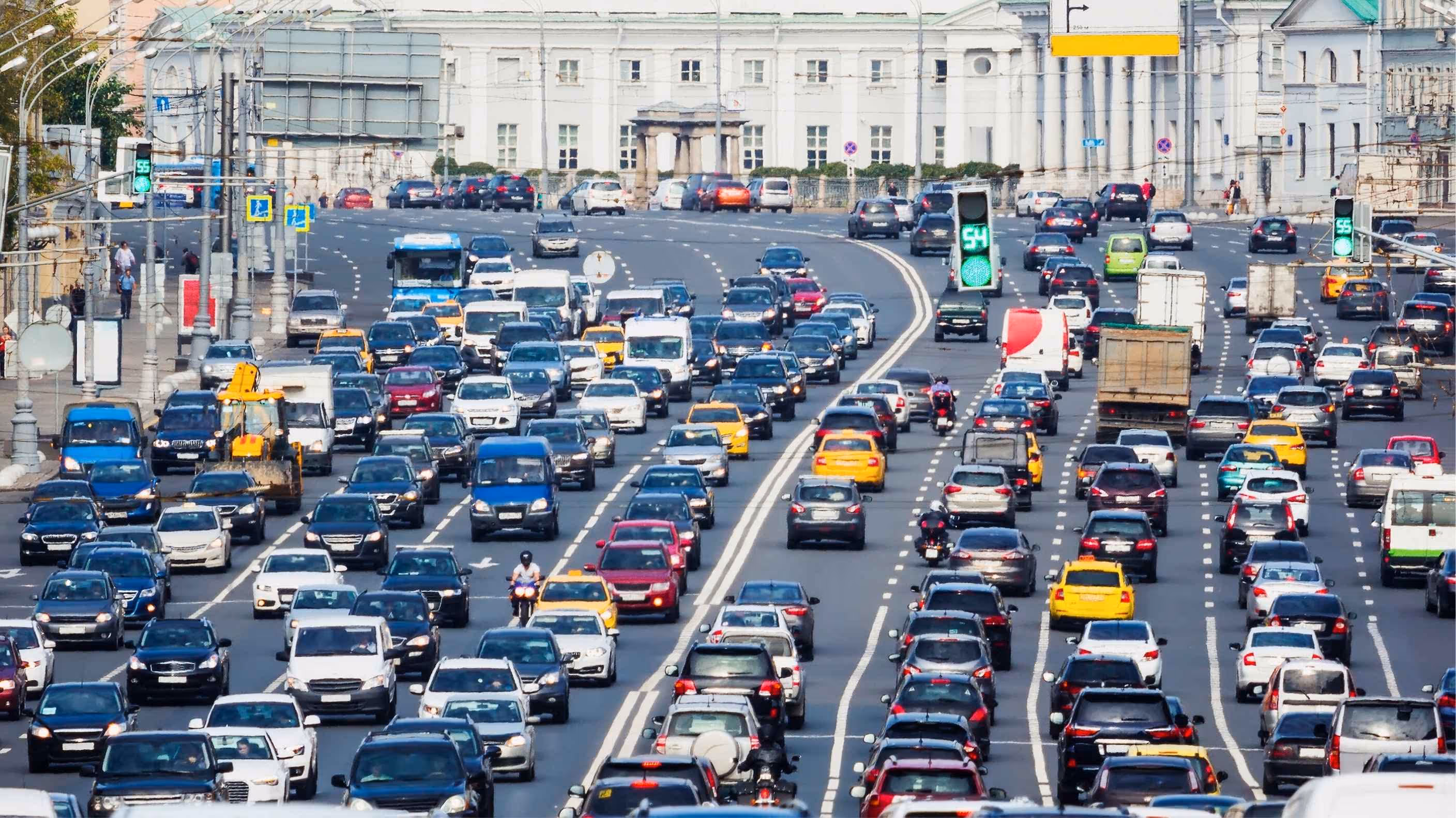 Heavy traffic congestion on a major city road with multiple lanes.