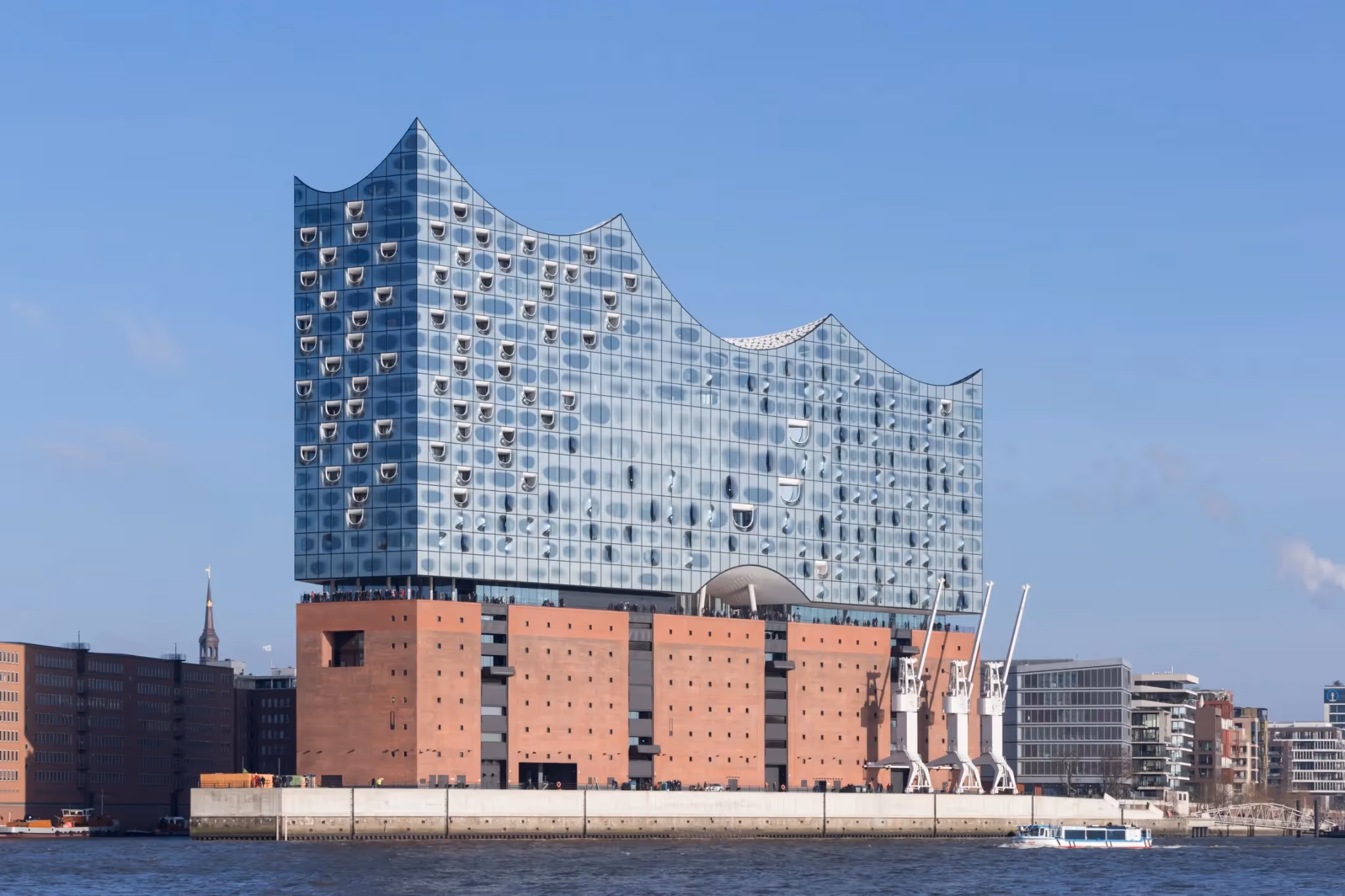 Waterfront view of Elbphilharmonie’s striking architectural design